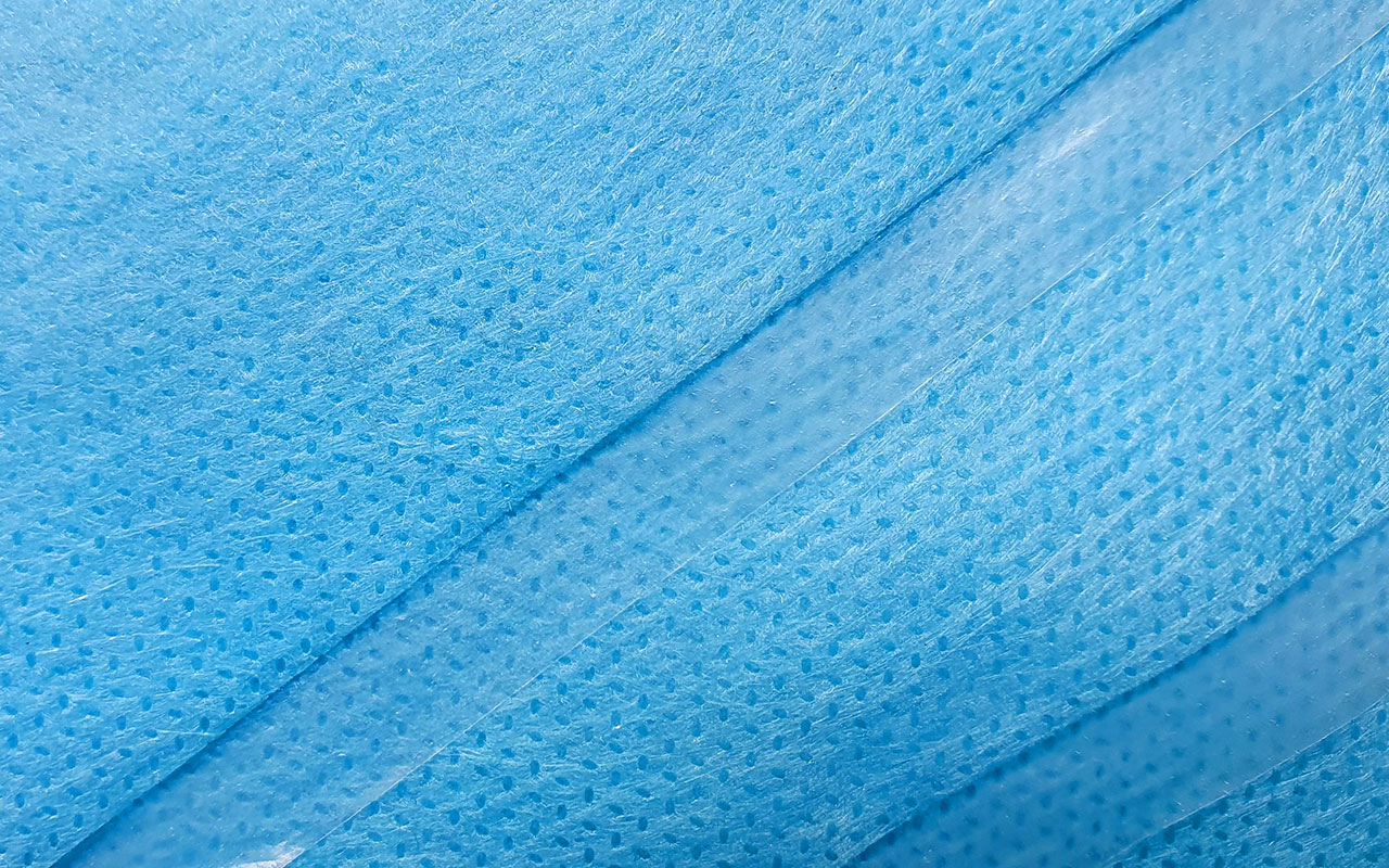 Breathable double-layer laminated non-woven fabric